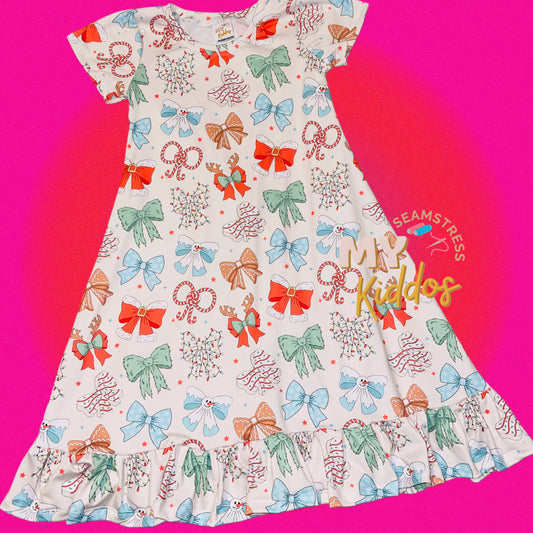 CHRISTMAS BOWS: SS SWING DRESS WITH AN ADDED RUFFLE 20 BD TAT